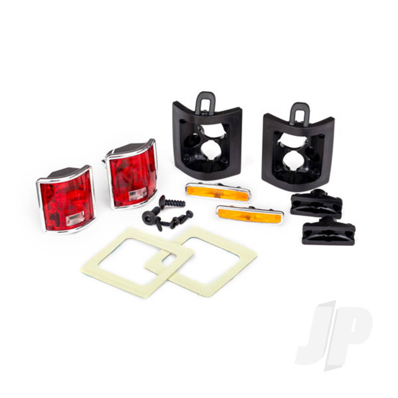 Traxxas Tail lights, left & right (assembled) / tail light retainers, left & right / side marker lights (assembled) (2 pcs) / side marker retainers (2 pcs) / mounting tape (2 pcs) / 1.6x5 BCS (self-tapping) (4 pcs) / 2.6x8 BCS (2 pcs) (fits #8130 Body)