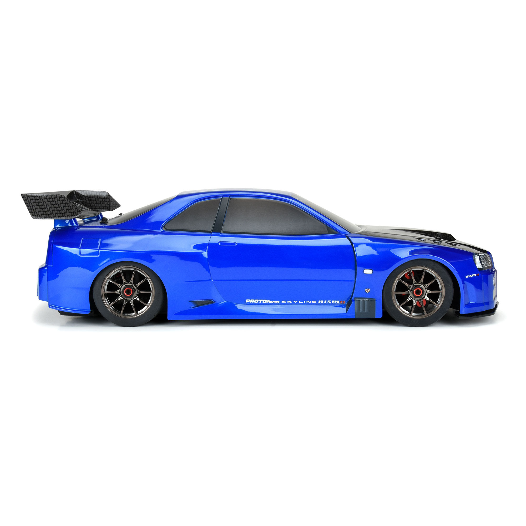 PROTOform is now offering the popular 2002 Nissan® Skyline GT-R R34 for Infraction™ 6S in a factory pre-painted option to you can hit your local street bash spot quicker than ever, in style! One of the most legendary tuner cars ever built, perhaps no 1:1 car captures the overpowered, all-wheel-drive, power-sliding, rubber-burning vibe of the ARRMA® Infraction™ 6S more than the car they call "Godzilla". The officially licensed body captures all the exceptional details of its 1:1 counterpart with some added wide-body JDM styling. It's pre-painted in stunning Bayside Blue with a carbon-fiber style hood and rear wing for a true tuner look. The R34 is made from durable 1.5mm thick high-quality polycarbonate and includes a custom add-on front splitter and rear wing to complete the super-scale package. Transform the look of your street basher with the iconic Skyline R34! No vehicle chassis is included with this product. PRM158413 | Pre-Painted / Pre-Cut 2002 Nissan® Skyline GT-R R34 (Bayside Blue) Body for ARRMA® Infraction™ 6S